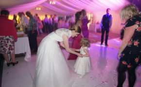 Bride dancing with bridesmaid